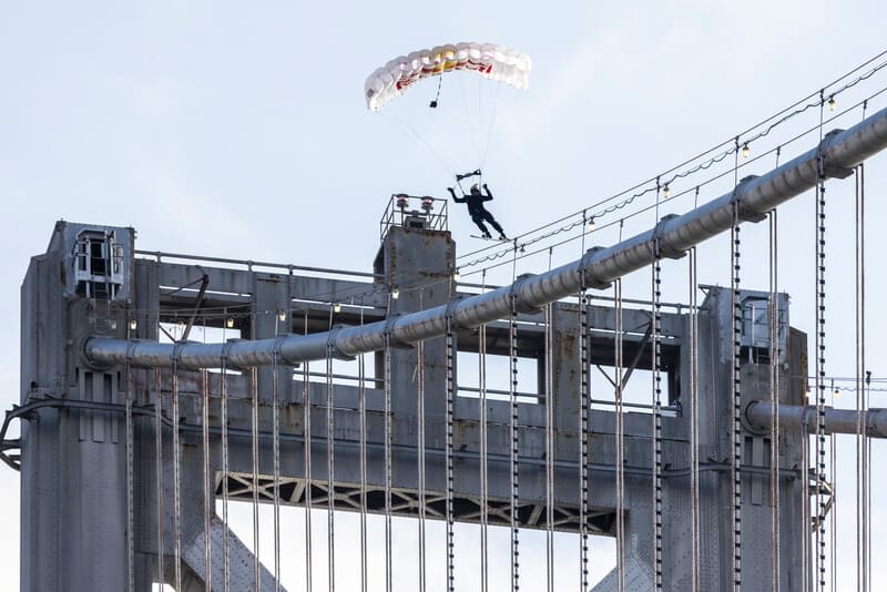 Sean McCormac lands on the Bay Bridge suspension cables.