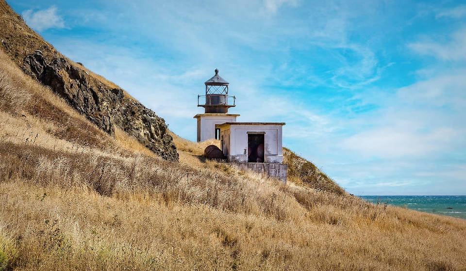 The ‘Alcatraz Of Lighthouses’ Sits Abandoned On CA’s Most Isolated Coastline, Overlooking Black Sand Beaches And Rugged Meadows
