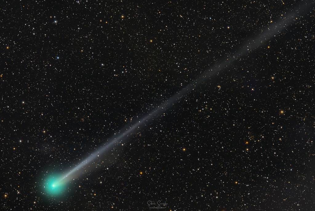 Green comet in a dark sky