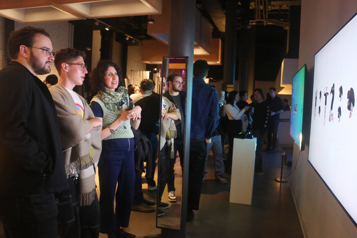 People looking at a projection