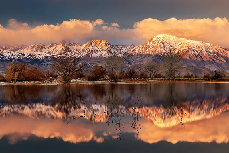 River and snowy mountains at sunset in Bishop CA.