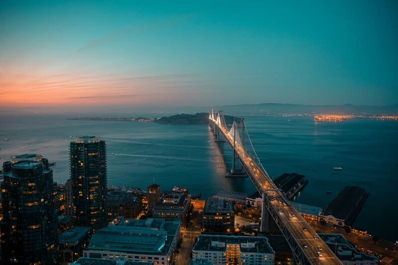 Bay Bridge lights at sunset.