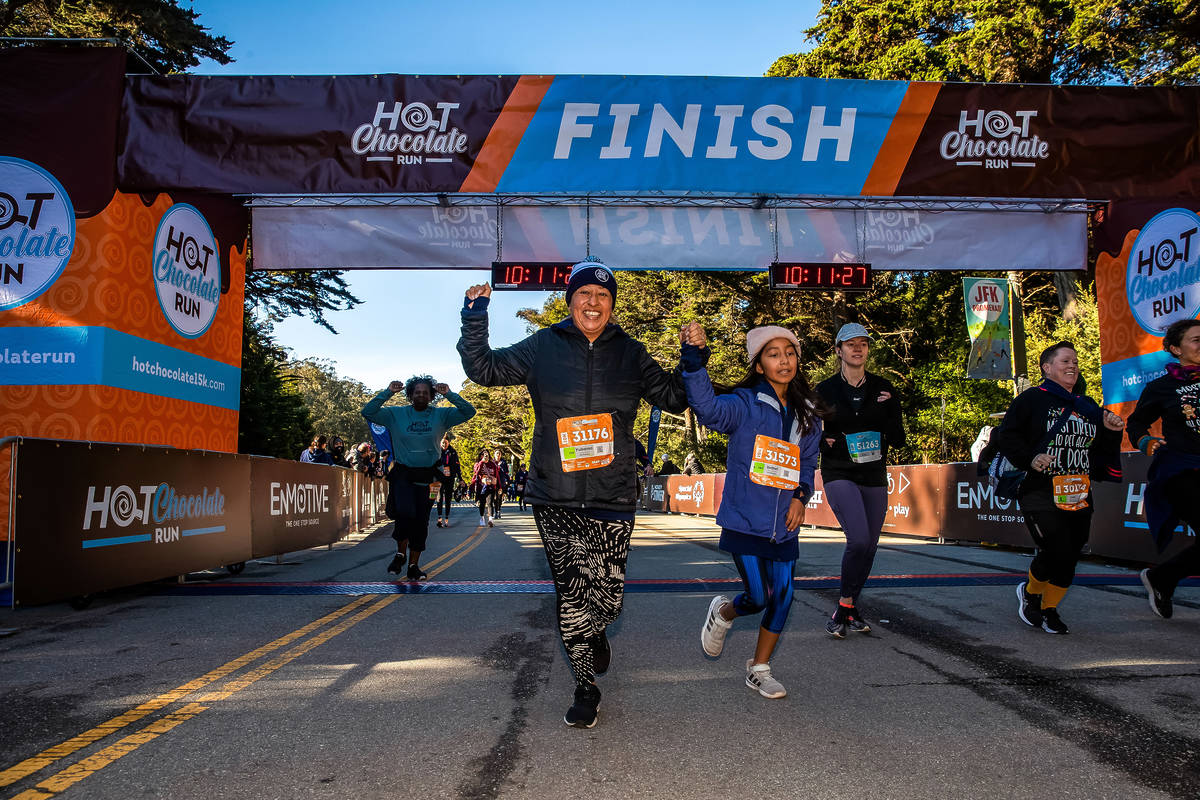 people crossing the finish line