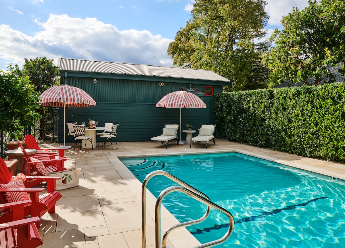 an outdoor pool at Little Saint