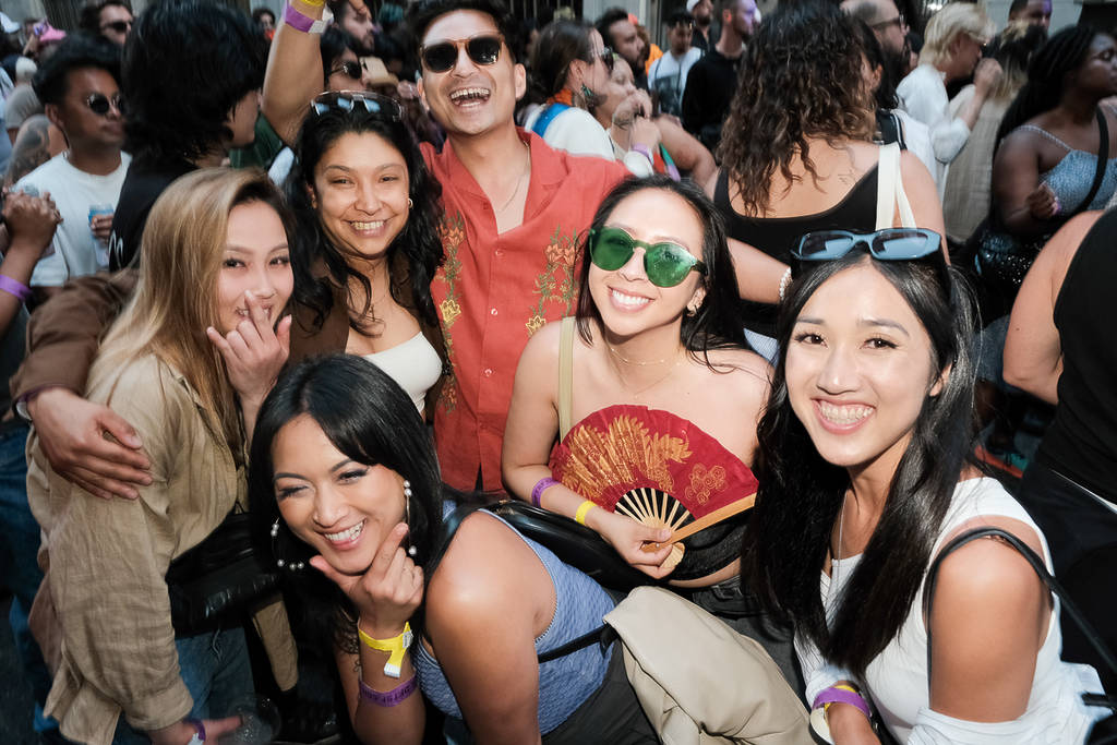 a friend group at a block party 