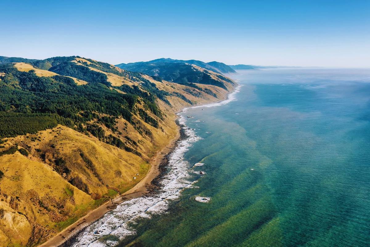 CA's most isolated coastline hides 75 miles of black sand beaches, twisted redwoods, and the ‘Alcatraz of lighthouses'