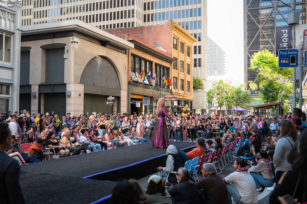 a crowd watching a drag performance