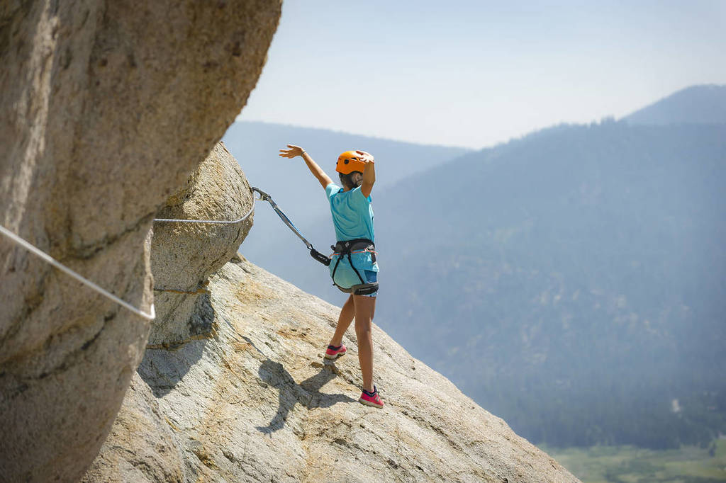 A kid enjoys Tahoe's Via Ferrata