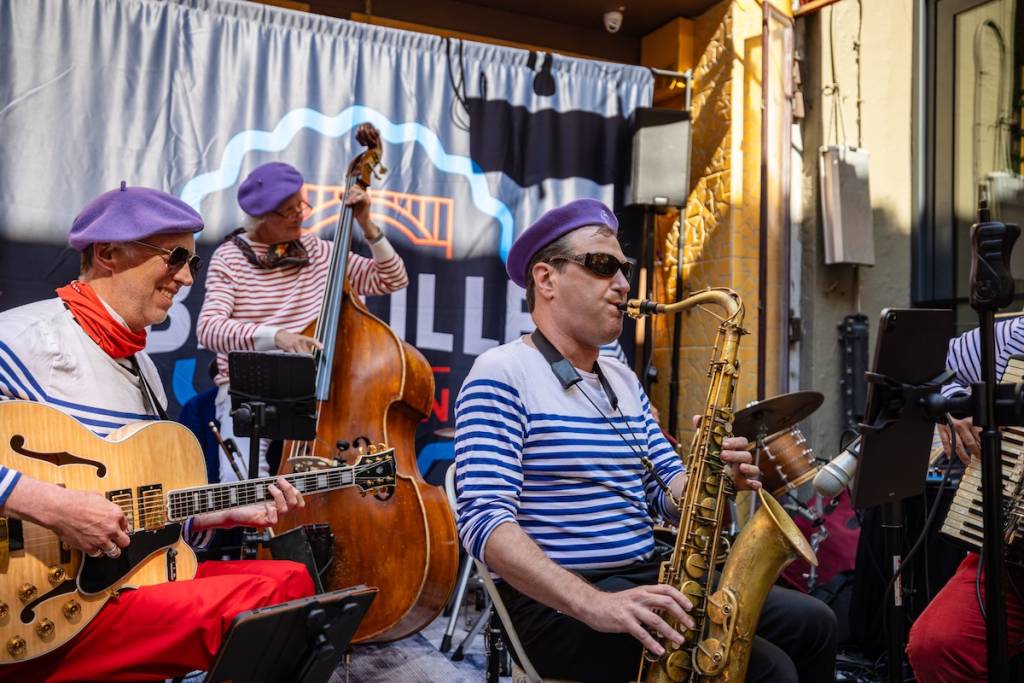 a band playing at a block party in SF