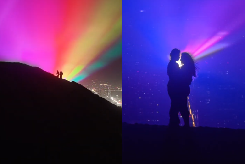 Silhouette of couple at Illuminate laser show