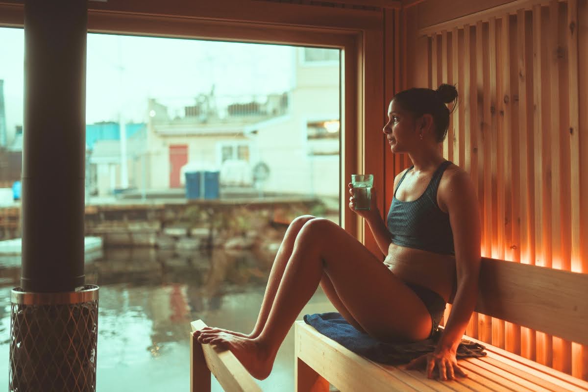 A woman steams in a sauna