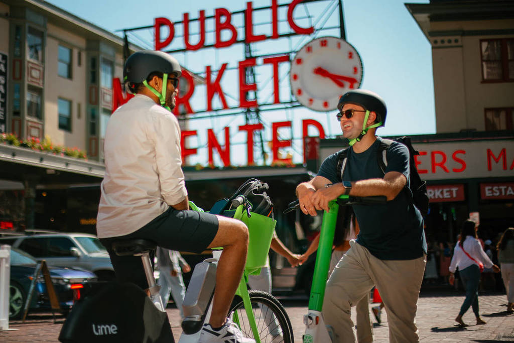 lime bikes and scooters at pike place market in seattle