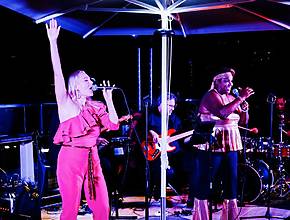 The Ultimate ABBA Tribute Concert Is Returning To Seattle For One Night Only — With Classic Cocktails &amp; Light Bites