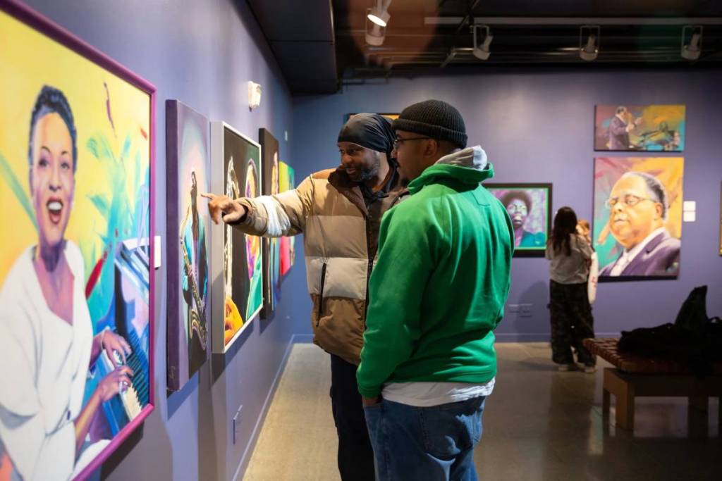 People viewing an exhibit at Northwest African American Museum