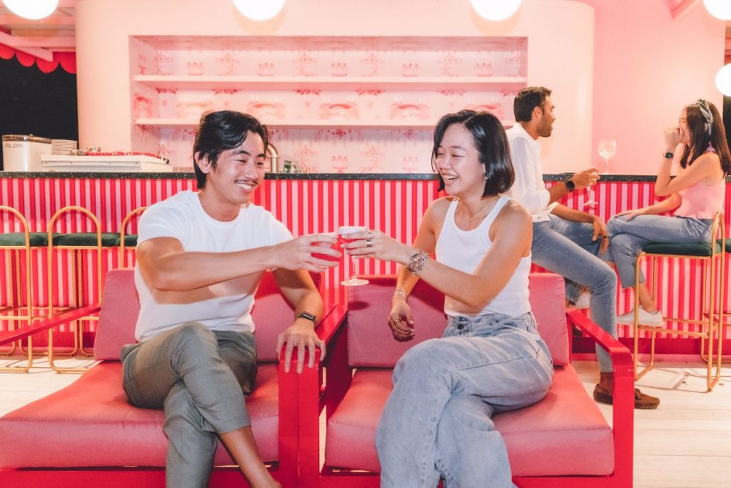 Couple At Museum Of Ice Cream Bar In Singapore
