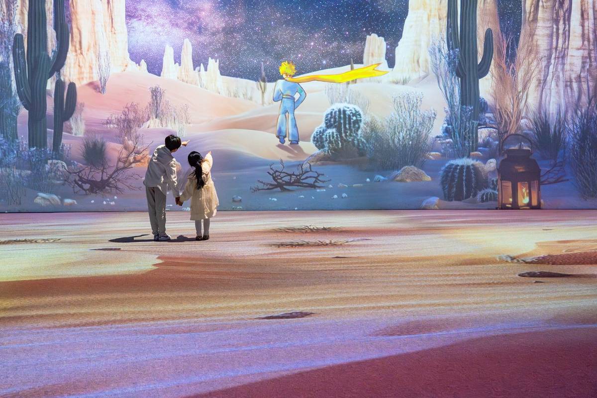 children watching 360-degree projections at The Little Prince