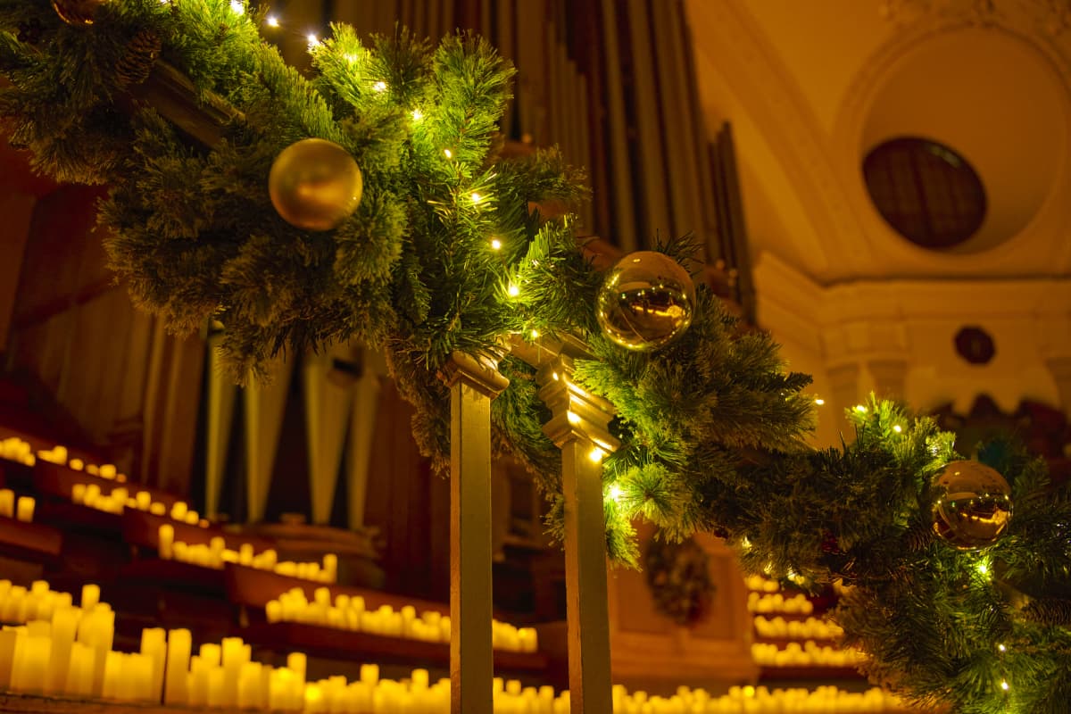 Candles and baubles at a Christmas Candlelight concert