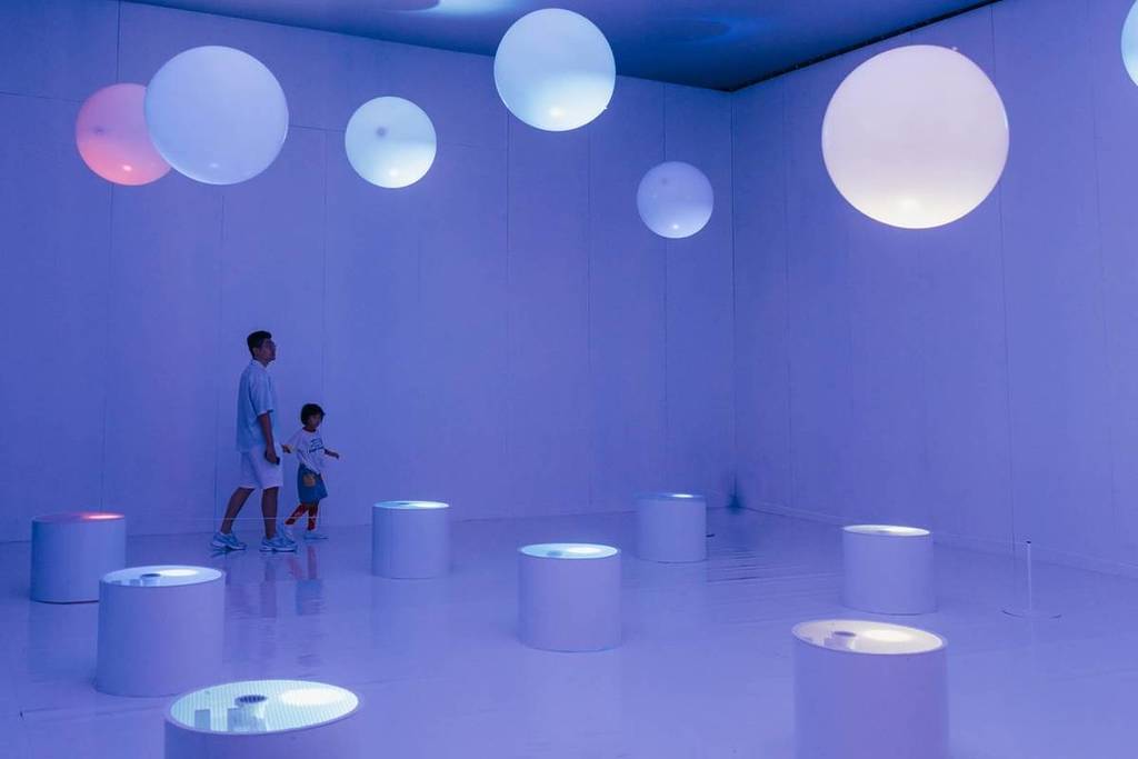 A father and son wondering through Pop Air: Art is Inflatable Balloon Museum best art exhibitions in Singapore