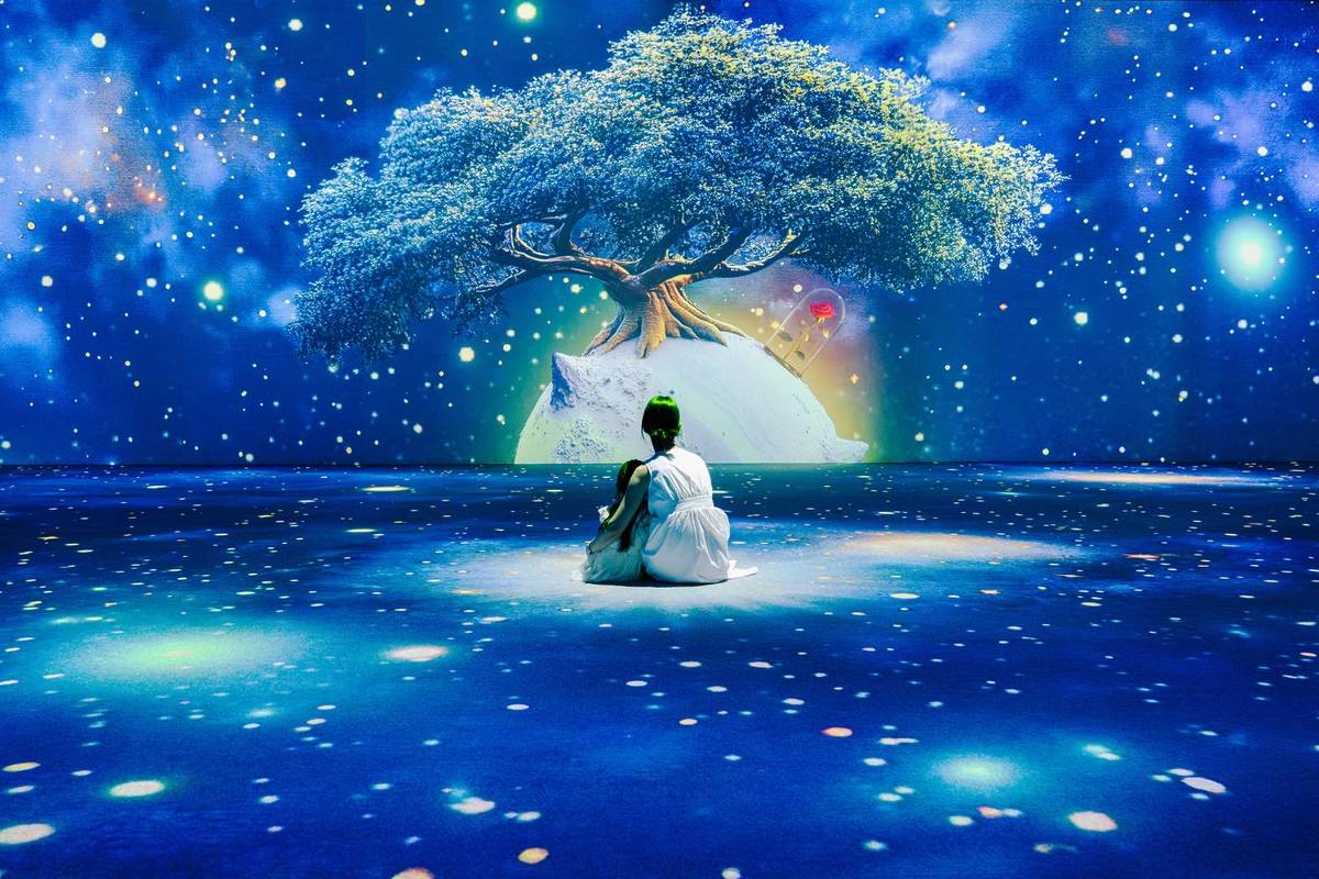 A mother and daughter watch as The Little Prince's emotional story is told around them in a sea of art things to do weekend