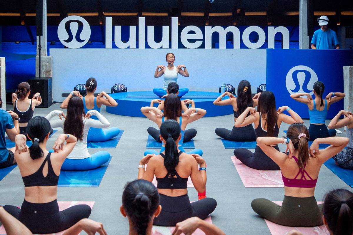 first-ever yoga & pilates studio within a Lululemon store opens girls at a class
