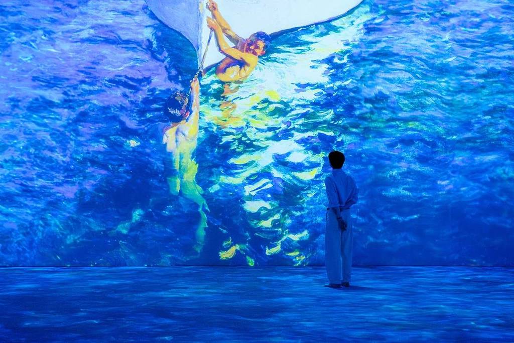 Joaquín Sorolla's paiting "The White boat, Javea" projected in a vivid display across the walls of GROUNDSEESAW Singapore