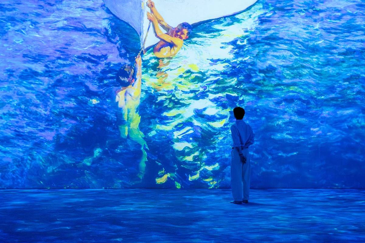 Joaquín Sorolla's paiting "The White boat, Javea" projected in a vivid display across the walls of GROUNDSEESAW Singapore