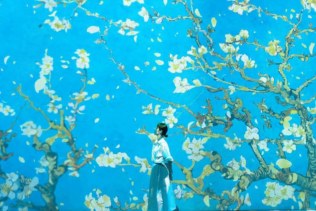 Vincent van Gogh's Almond Blossoms painting projected along the walls of GROUNDSEESAW's Van Gogh Inside Exhibition