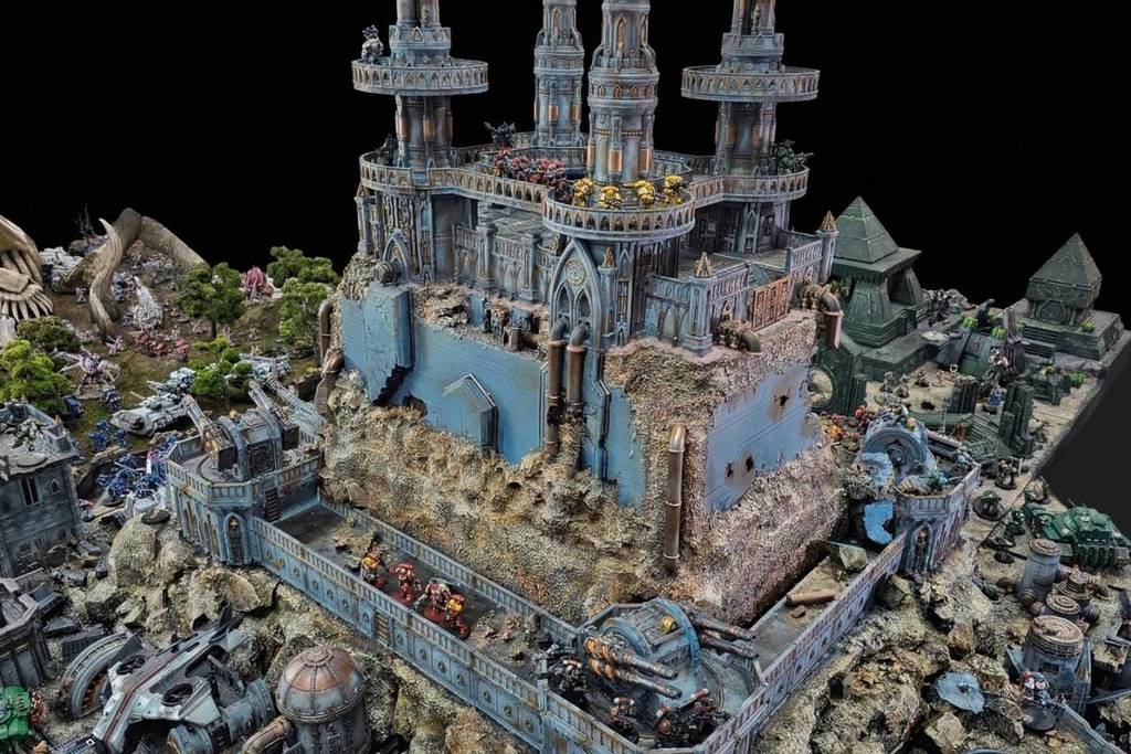 The "Forever War" miniature diorama at Portals depicting a medieval fantasy battle scene