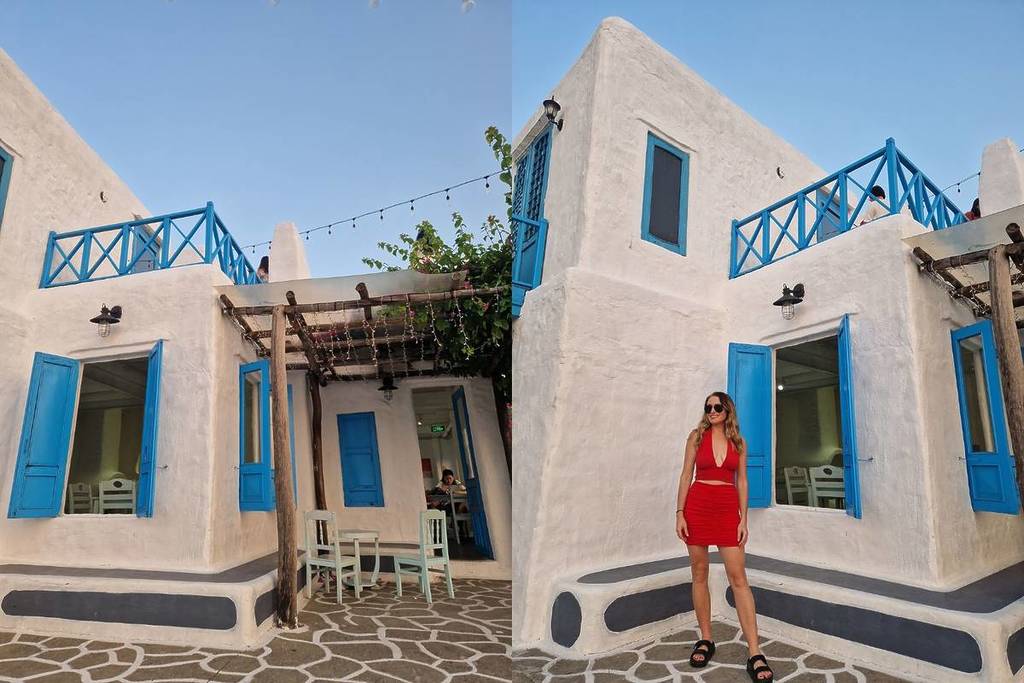 girl poses at Son Tra Marina the Santorini of Asia hidden in Vietnam Da Nang white and blue buildings