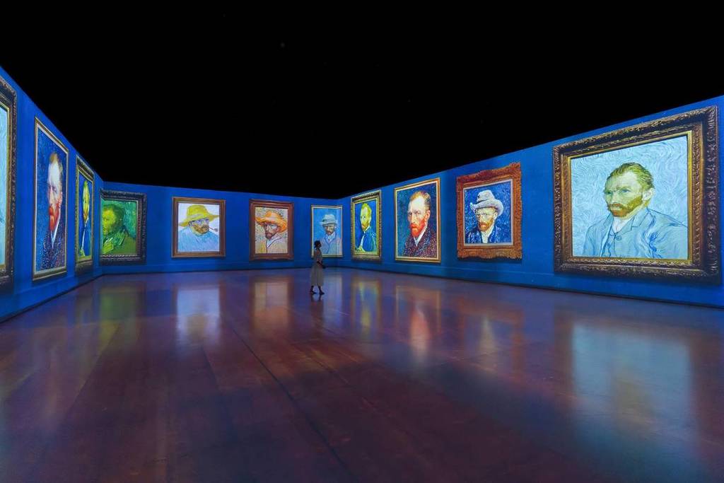 A series of Van Gogh's self portraits projected along the walls of GROUNDSEESAW