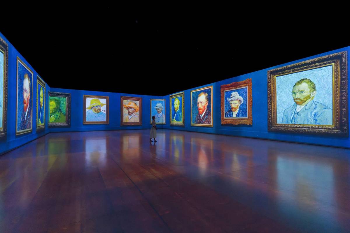 A series of Van Gogh's self portraits projected along the walls of GROUNDSEESAW