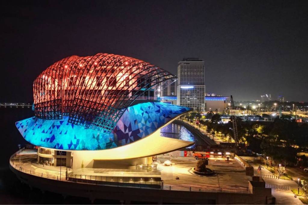 exterior of the floating art gallery at night