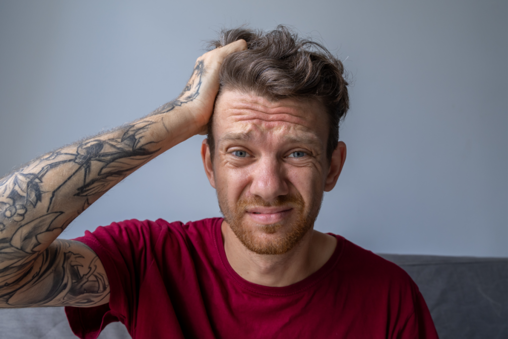 man with ADHD struggles to focus 