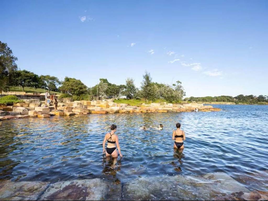 people in bathing suits at marrinawi cove