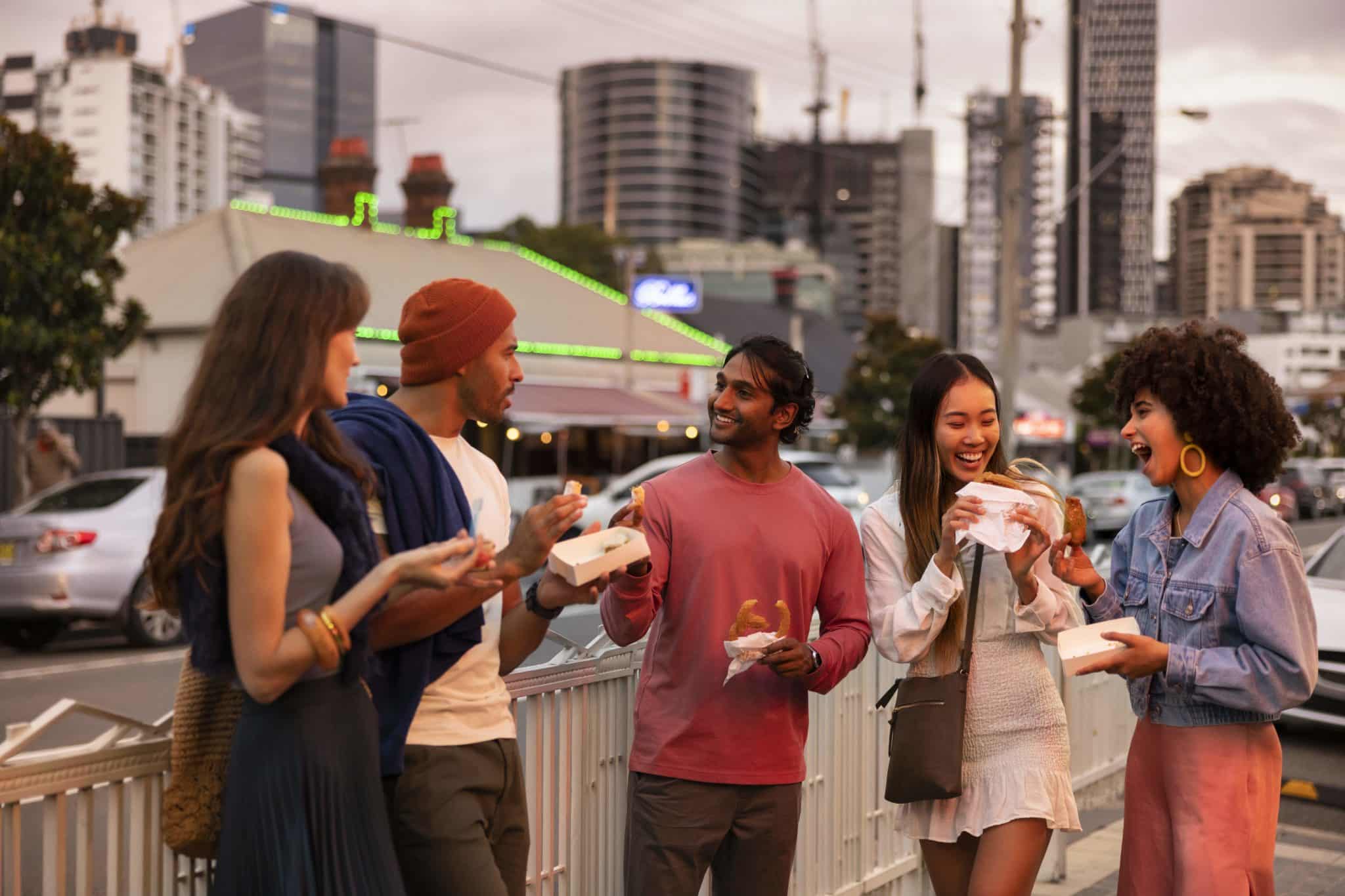Friends walking through Little India in Harris Park