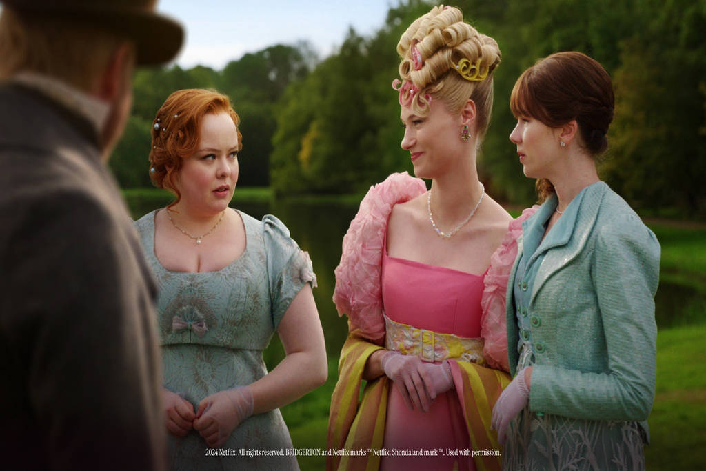 Penelope Featherington, Cressida Cowper, and Louise Bridgerton chatting.