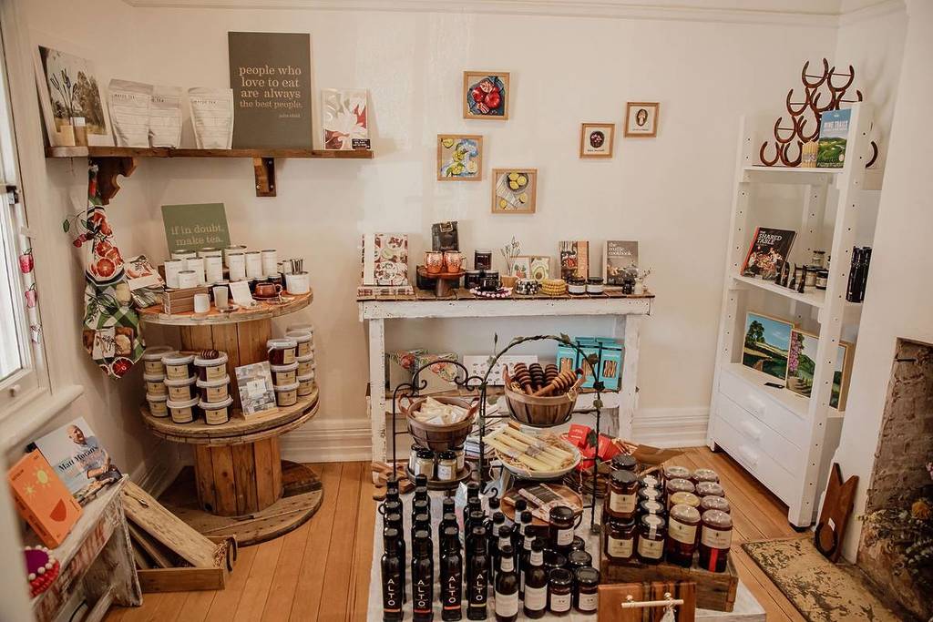 Teas, snacks, and jars of local goods displayed in a cosy, rustic setting at Milbrey Kitchen and Store in Oberon