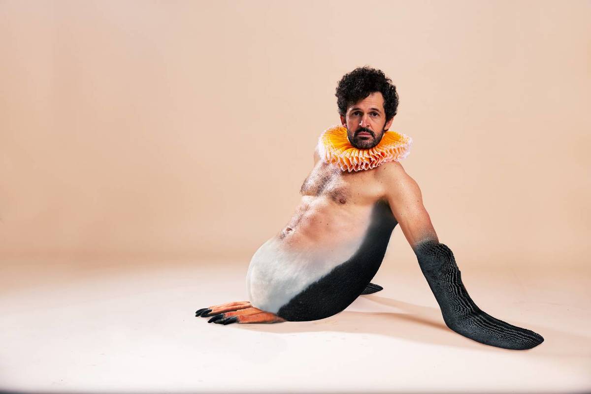 Garry Starr depicted as a bare chested penguin promoting Garry Starr: Classic Penguins