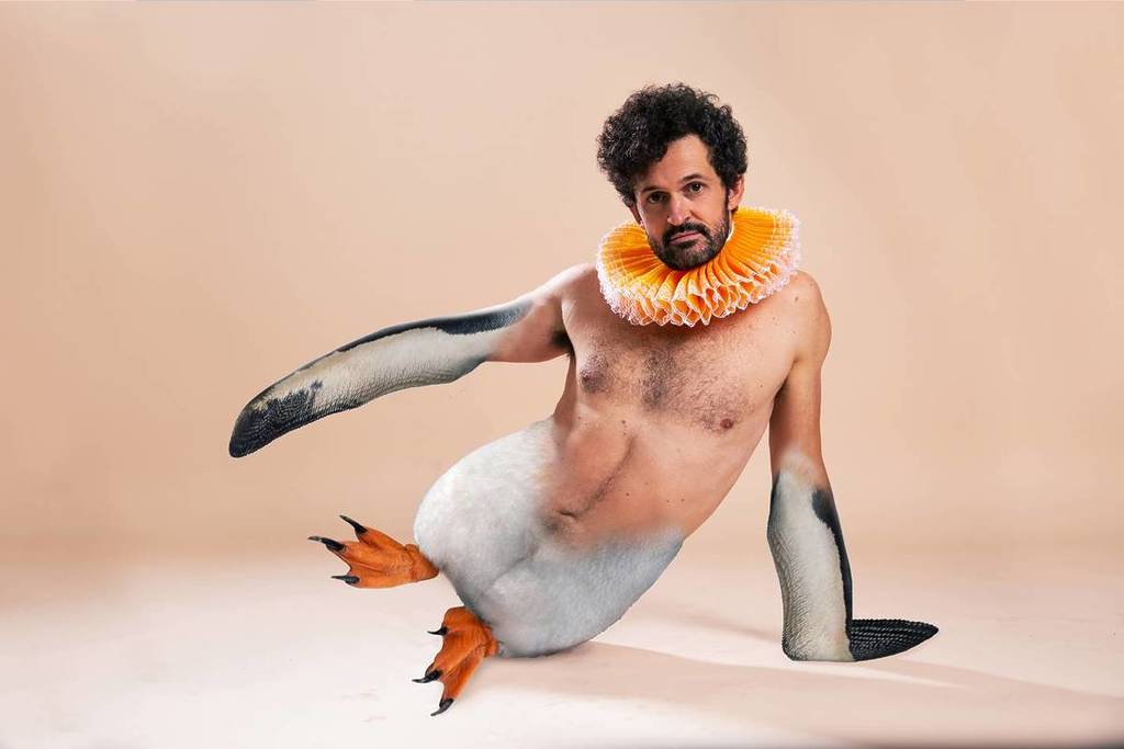 Garry Starr depicted as a bare-chested penguin