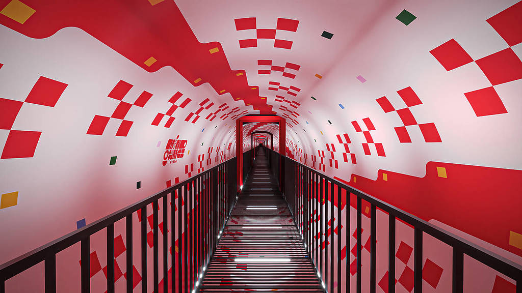 A long, endless walkway in a pink tunnel at Mind Games: Art Alive!