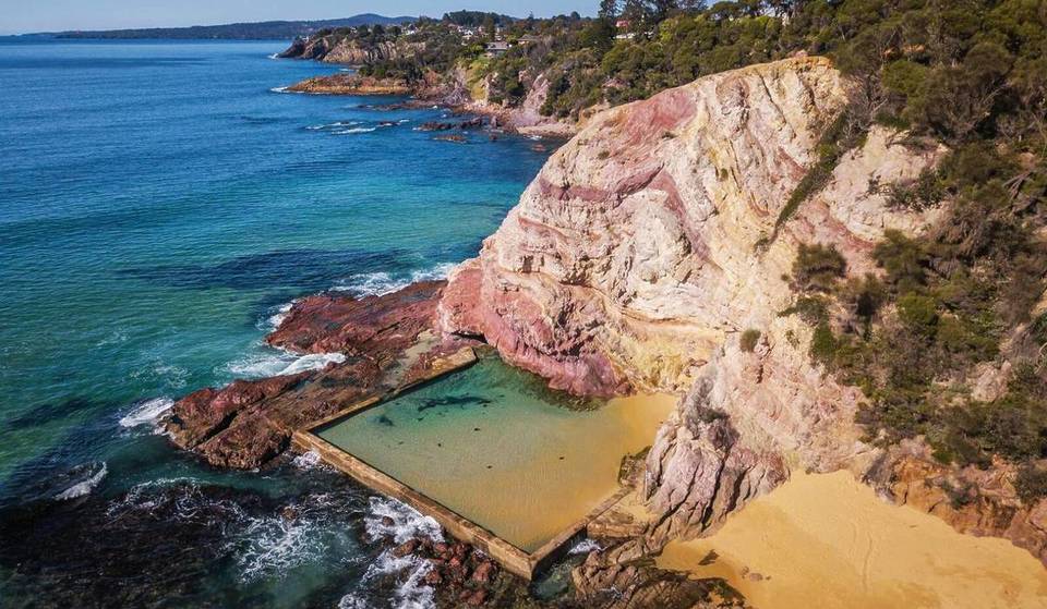 The Prettiest Rock Pool In NSW Is Surrounded By Dramatic Pink Cliffs And Clear Turquoise Waters – Perfect For Summer