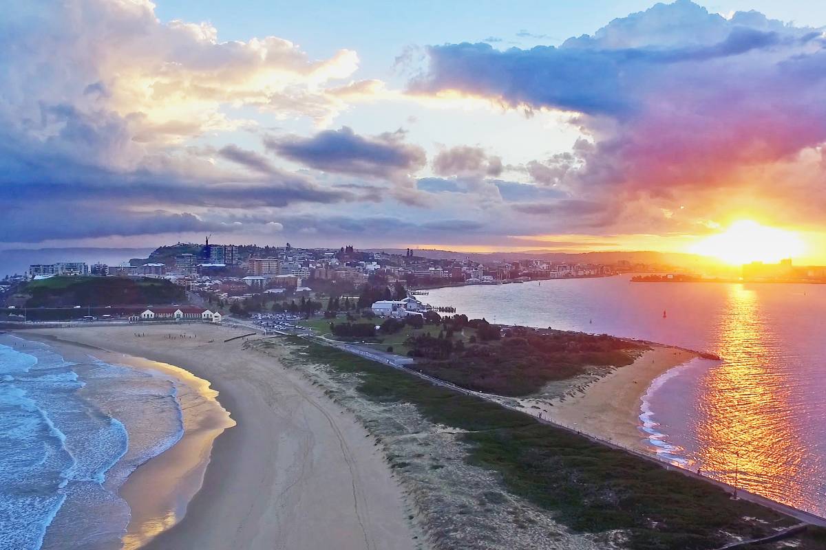 An ariel view of Stockton and Nobby's Beach at sunset