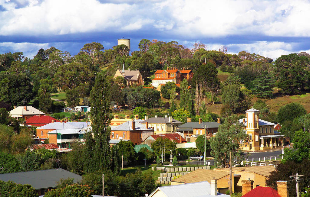 View over Carcoar village, showcasing its charming historic buildings and lush greenery