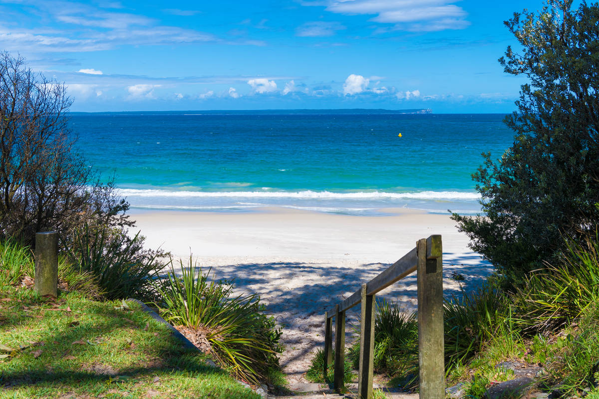 White sand beach with turquoise water near Huskisson on Jervis Bay