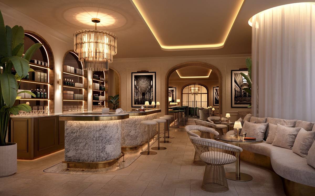 Luxe cafe and lounge area at Saint Haven North Sydney with marble bar, chandelier lighting and curved seating