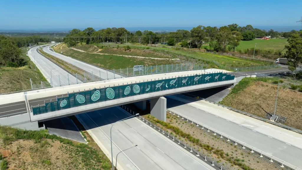 Bridge with Aboriginal artwork crossing the new M12 Motorway in Western Sydney