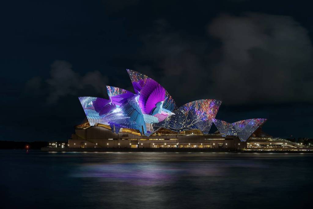 Sydney Opera House sails illuminated with colourful bird projections for Vivid Sydney 2026