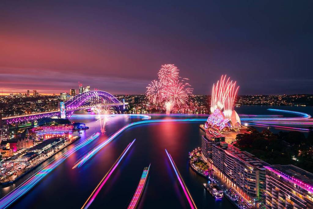 Sydney Harbour illuminated with fireworks, light trails and projections during Vivid Sydney