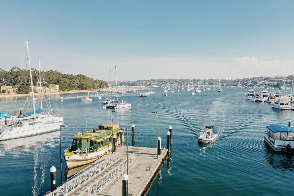 Cronulla to Bundeena ferry crossing Port Hacking with boats and waterfront homes