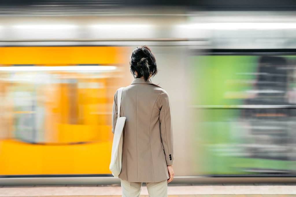 woman waiting of train in sydney